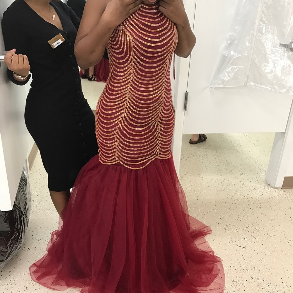 Beautiful Burgundy and Gold dress .